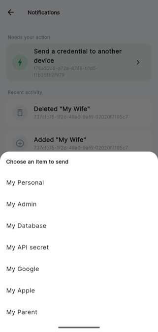 The Android app's notifications screen, prompting the user to choose which saved credential to send to the requesting device.